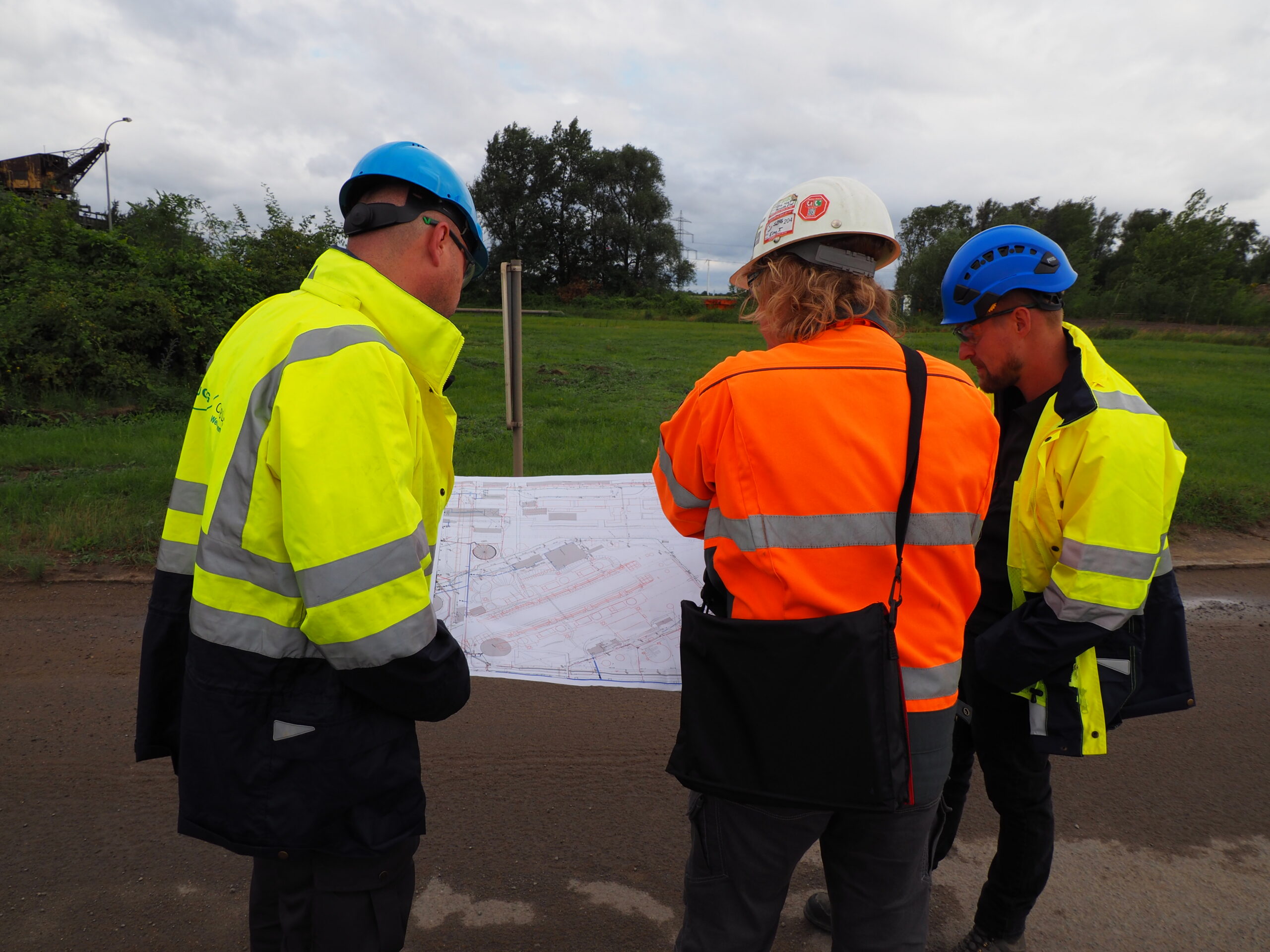 Brugg Cables crew performing underground high voltage cable jointing work in excavation pit