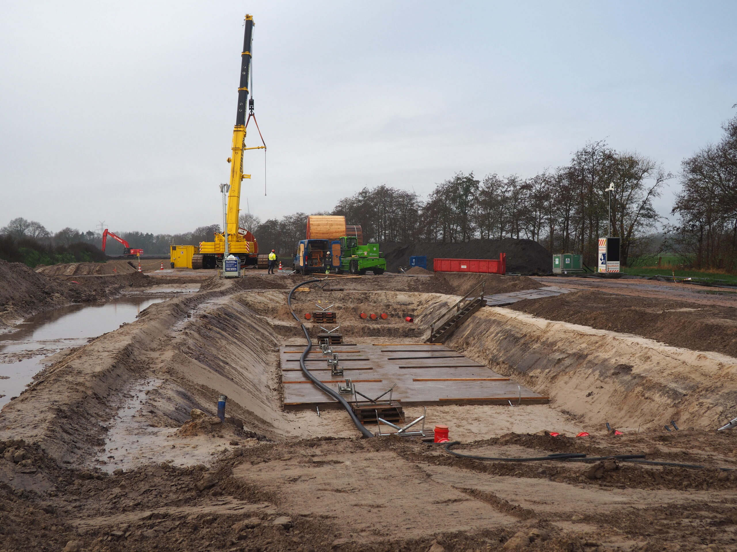 Preventive Maintenance for cable systems 1 Brugg Cables high voltage underground cable installation site with crane during preventive maintenance project