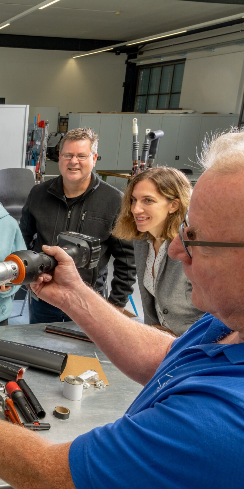 Brugg Cables career opportunities shown in training workshop with cable tools Brugg Cables career opportunities shown in training workshop with cable tools